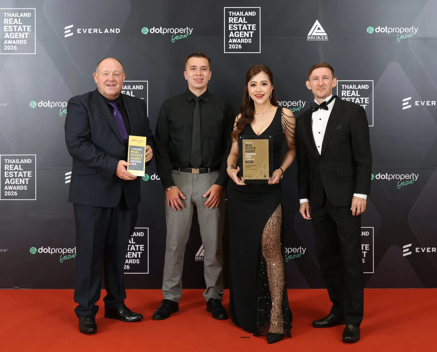 The East Coast Real Estate team with The Best Agent in Pattaya trophy at the Thailand Real Estate Agent Awards 2026